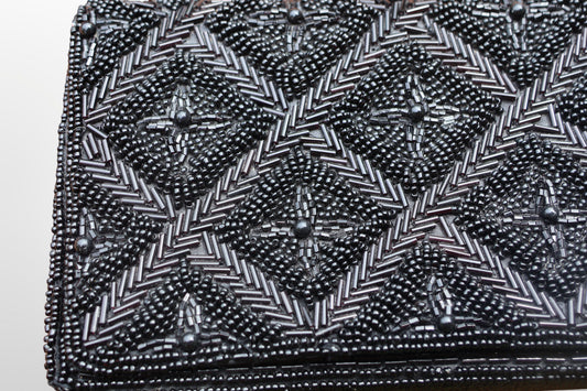 Black beaded clutch bag