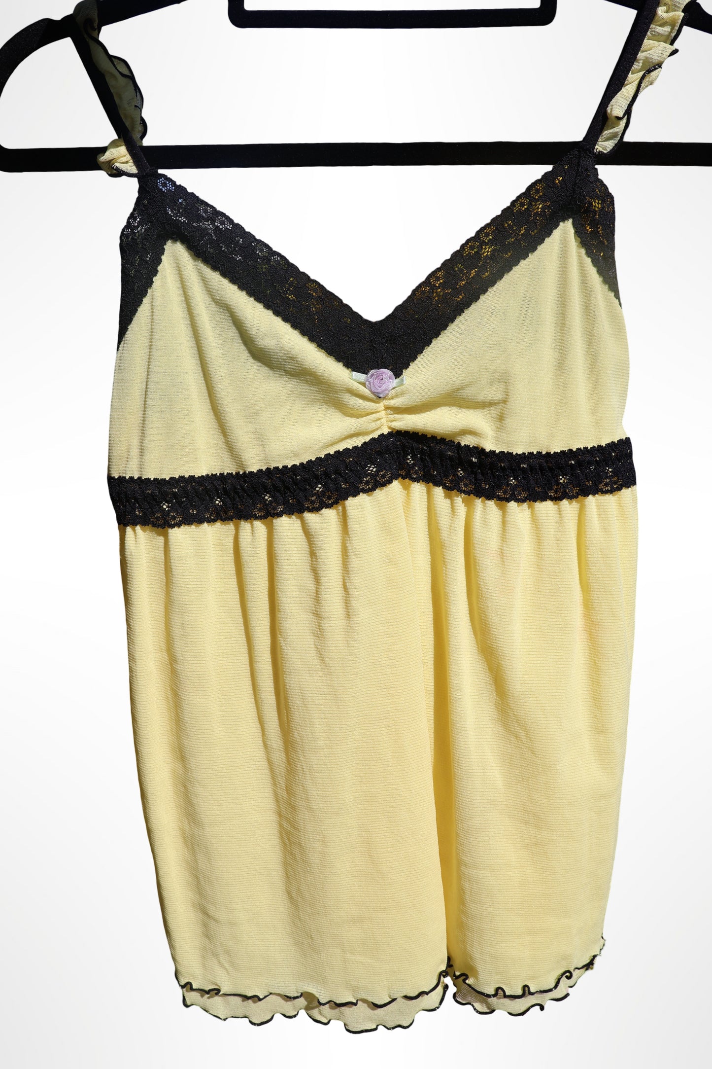 Yellow cami with black lace and flower detail