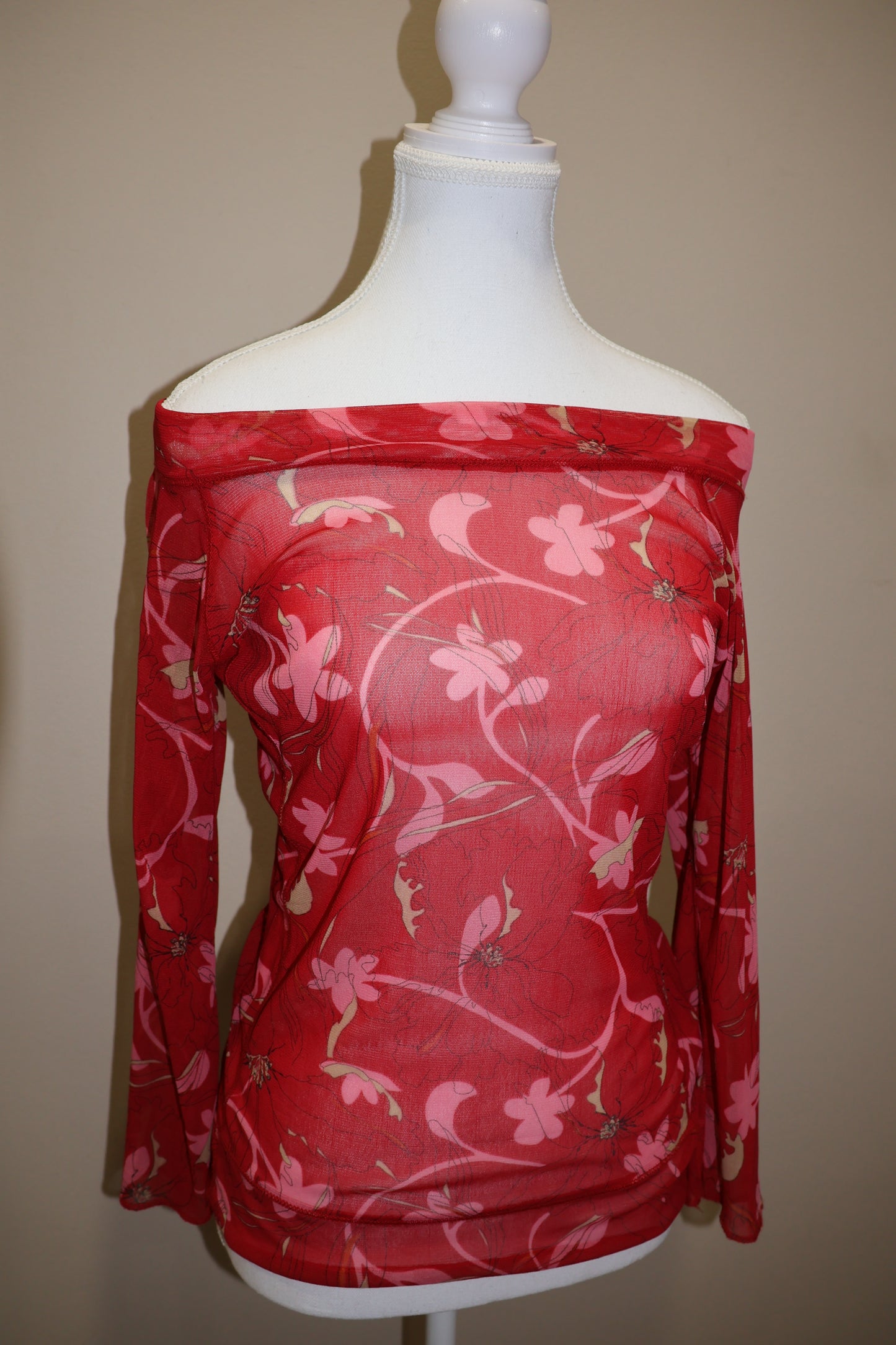 Floral sheer of the shoulder top