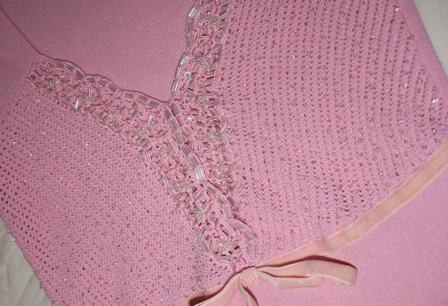 Beaded pink top with pink bow detail