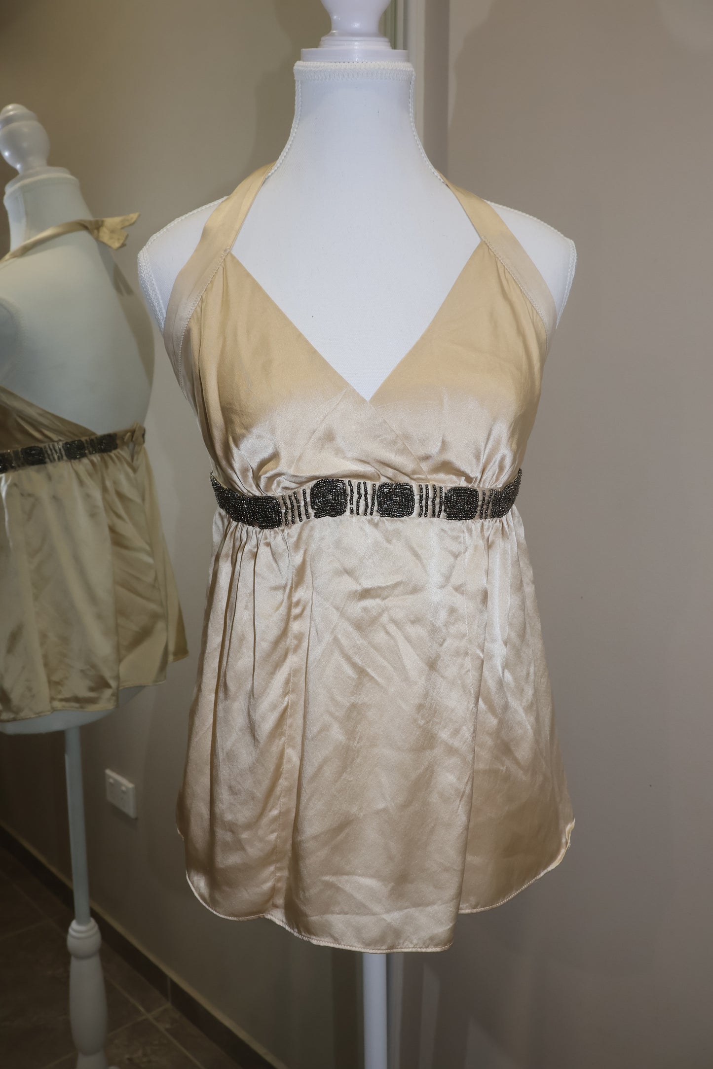 Cream halter neck top with beaded detail!